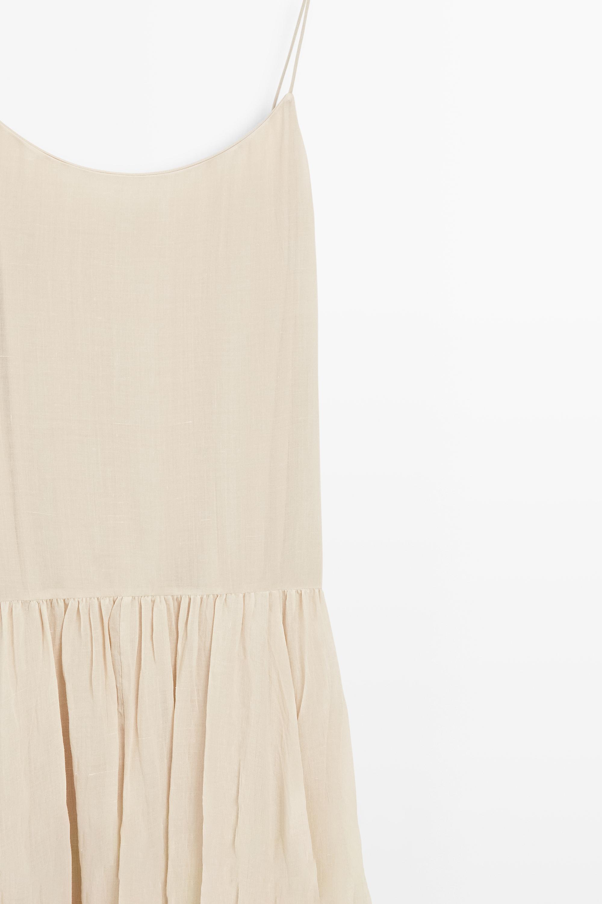 Flowing midi dress with pleated detail